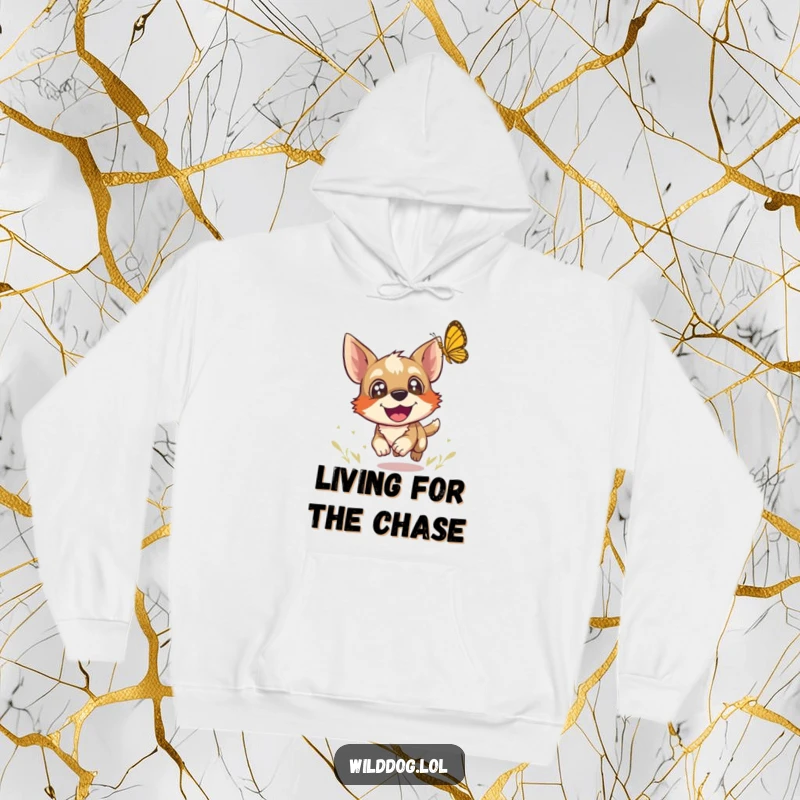 Funny hoodie featuring a wild dog with joyful eyes chasing a butterfly, providing warmth and a reminder of playful freedom.