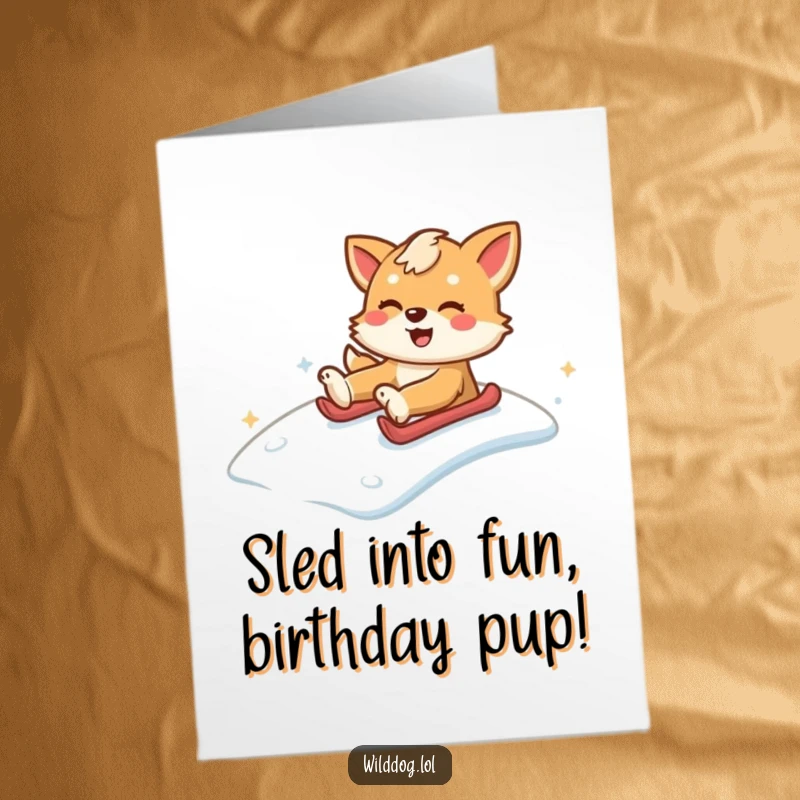 Funny Free Printable Birthday Card: Wild dog gleefully sliding down a snowy hill.